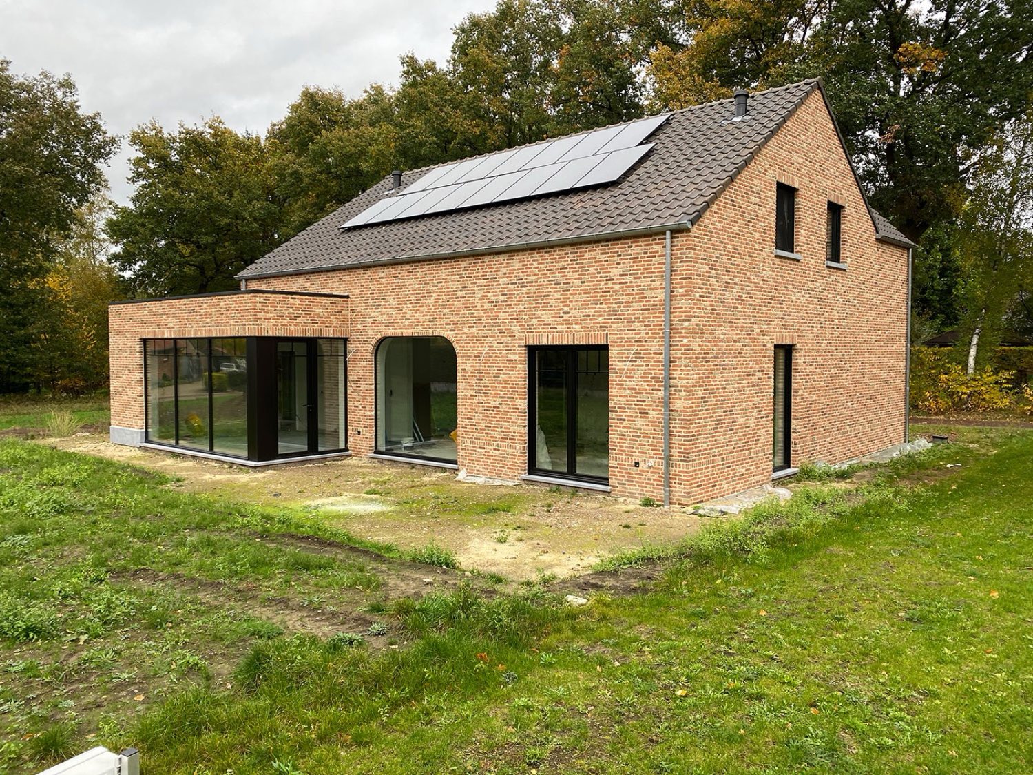 Ruwbouw pastorijwoning in As — dakstructuur