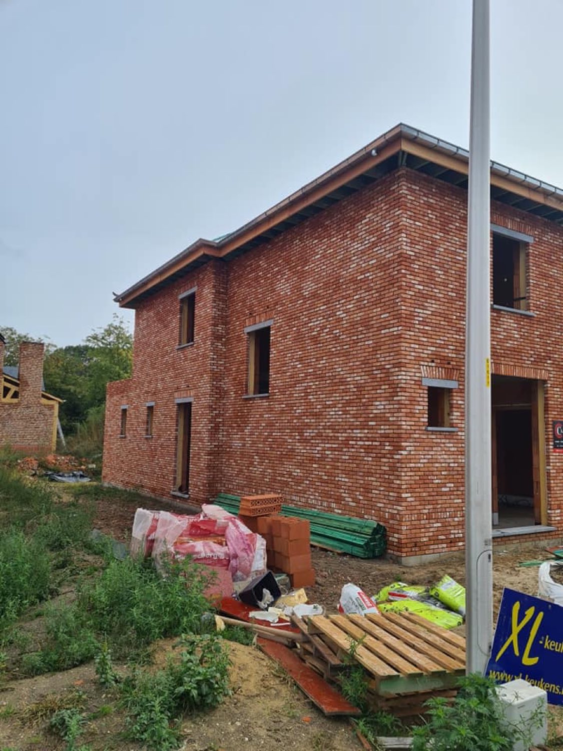 Ruwbouw pastorijwoning in Oudsbergen — gevel