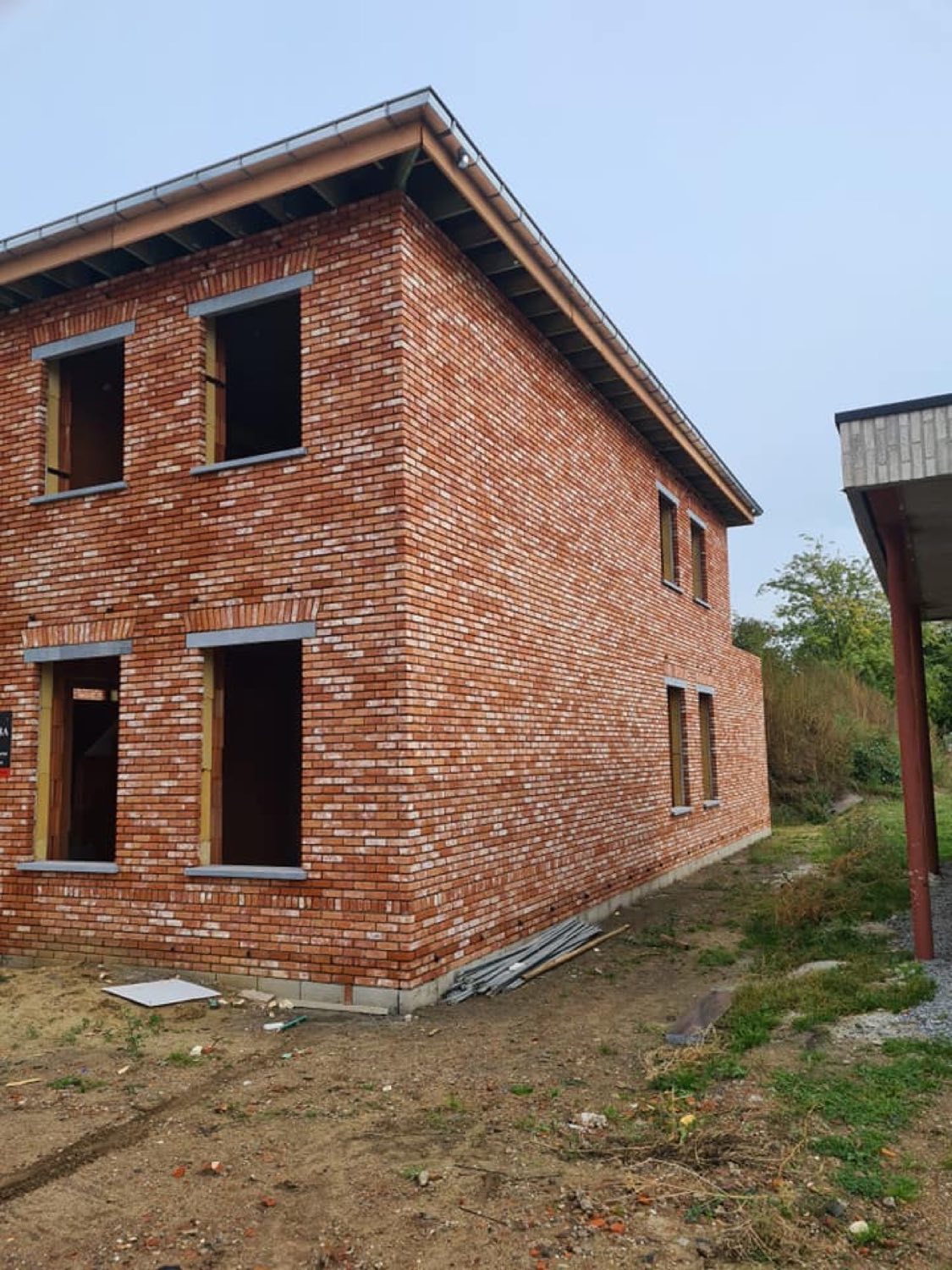 Ruwbouw pastorijwoning in Oudsbergen — raampartij